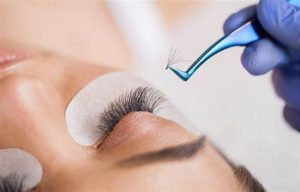 A woman with beautiful eyelashes wearing false eyelashes after LASIK surgery.